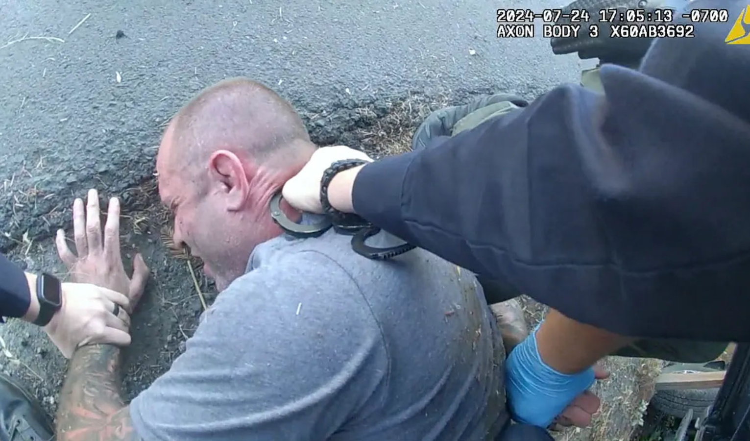 Body camera image from Jeffrey Callaghan arrest in Sebastopol civil rights case